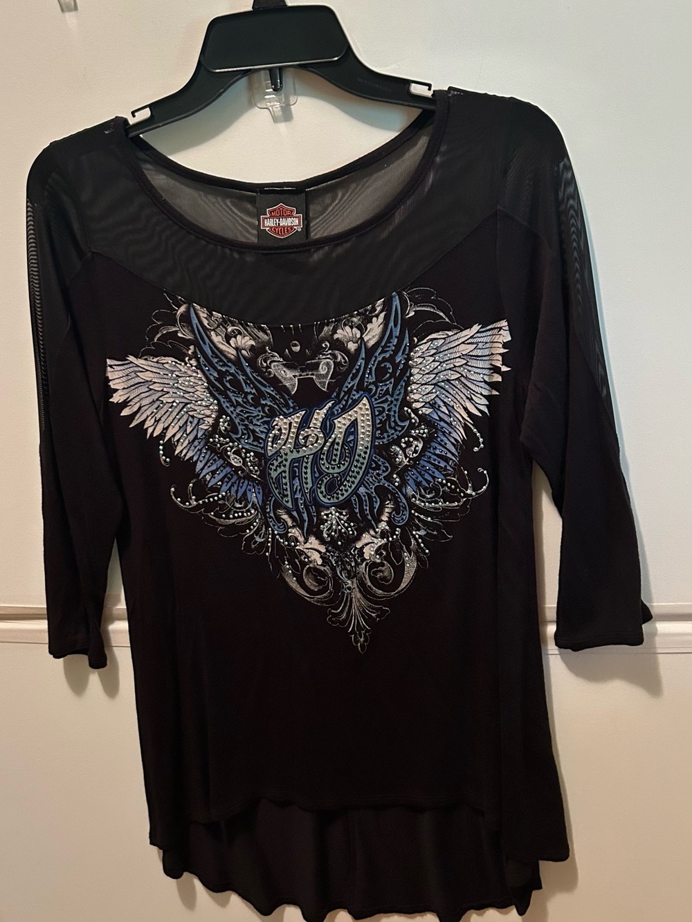 Woman’s Harley-Davidson Black 3/4 sleeves with Blue Winged Graphic. M